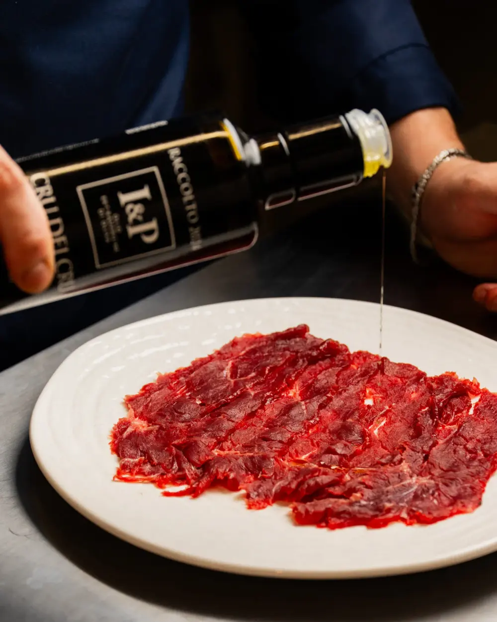 Carpaccio di manzo con sale Maldon e olio extravergine Caninese
